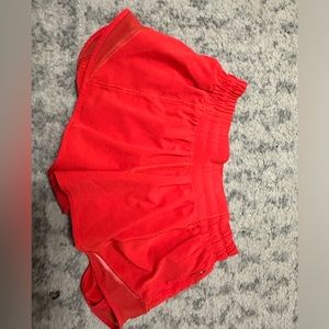 lululemon hotty hot shorts size 2 in a vibrant red color!